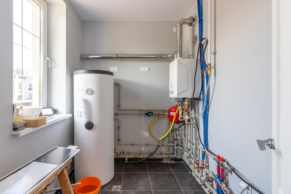 Hot water cylinder and boiler in a utility room
